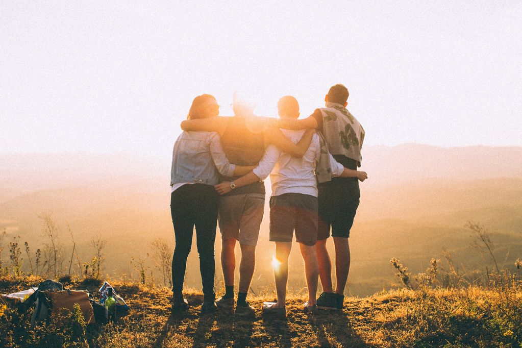 Friends from the FanOfFailure community laughing together outdoors